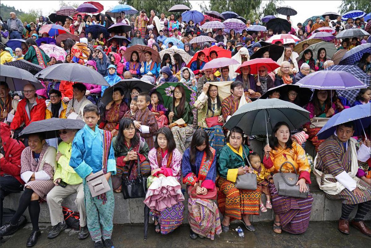 Image of People, Crowd, Community, Public space, Event, Umbrella etc.
