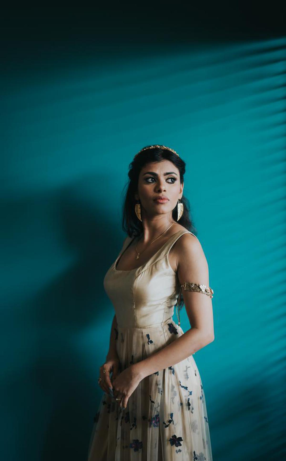 Image of Blue, Photograph, Green, Lady, Beauty, Dress etc.