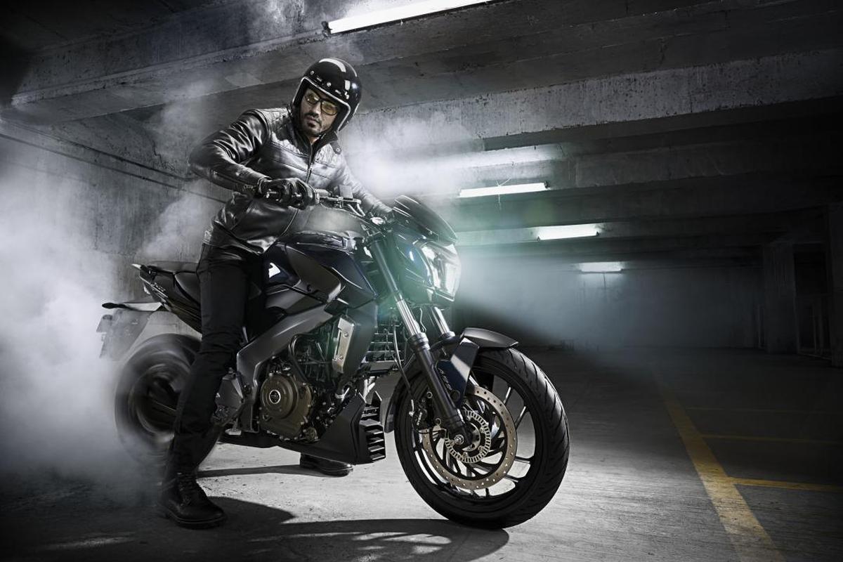 Image of Land vehicle, Motorcycle, Vehicle, Motorcycling, Stunt performer, Automotive tire etc.